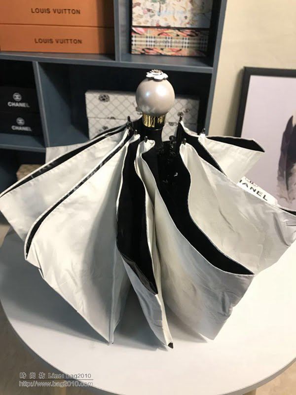 CHANEL香奈兒傘 火爆新款 山茶花搭配經典的香奈兒LOGO 珍珠球手柄 晴雨傘 防曬隔熱 防紫外線  zm1058